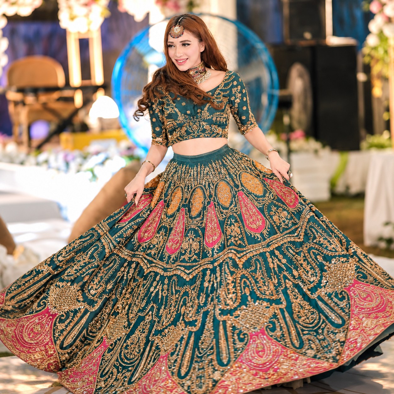 Anam Malik wearing Ahmad Sultan Suraz emerald teal lehenga with intricate antique gold embroidery