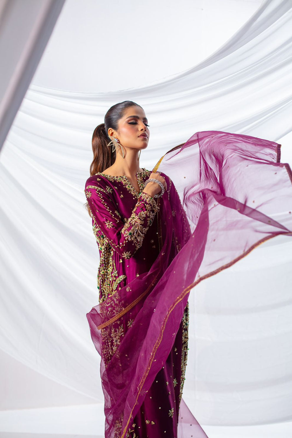 Batik Expressive Magenta luxury Pakistani formal outfit featuring a long embroidered A-line shirt and coordinating trousers