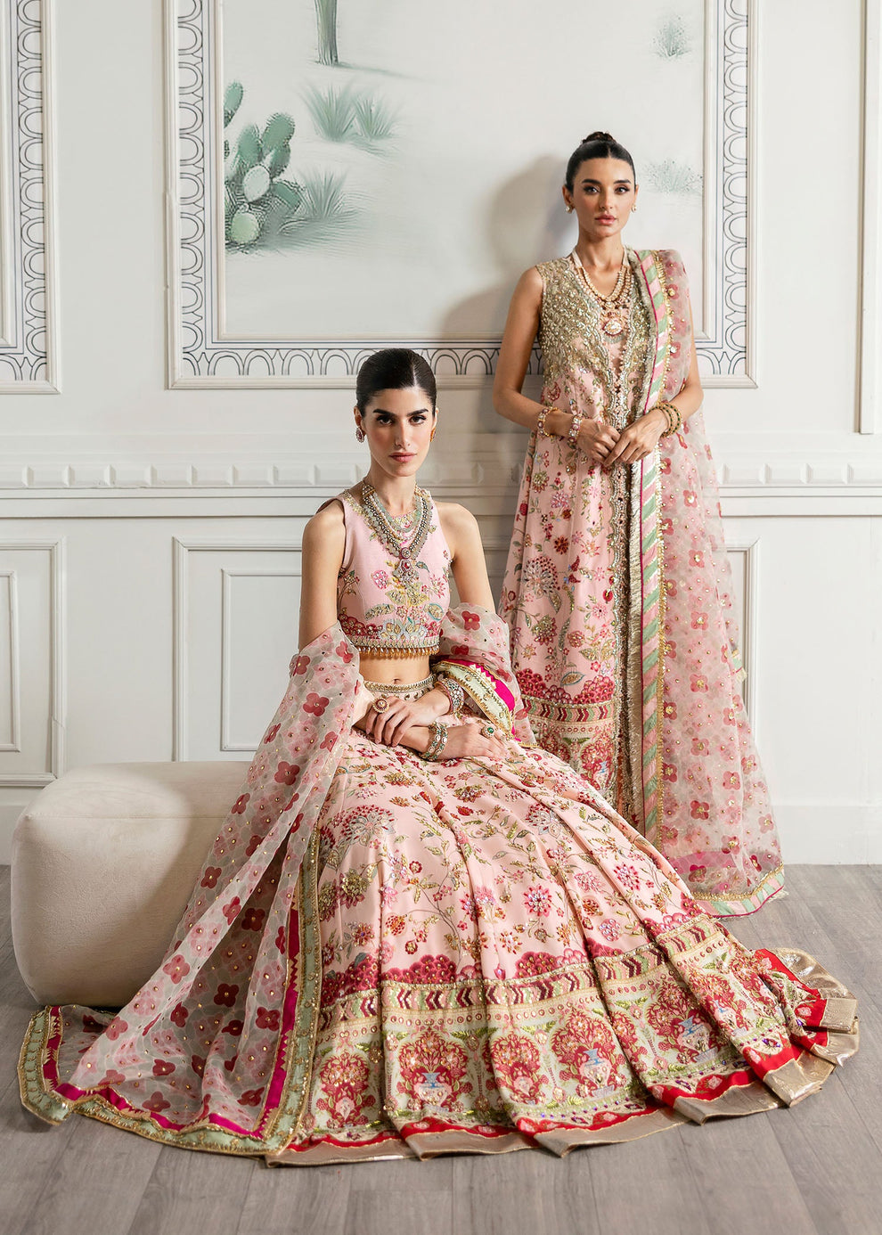 Crimson Crystal Chinoiserie luxury Pakistani designer lehenga choli featuring a flared pink floral raw silk skirt