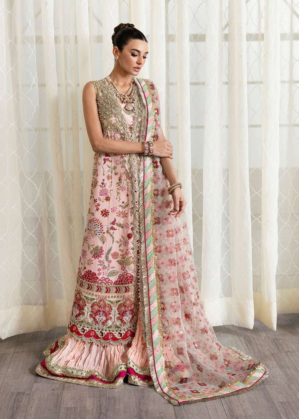 Zaneeb Raza modelling Crimson by Saira Shakira Crystal Chinoiserie pink Pakistani wedding lehenga with floral organza dupatta