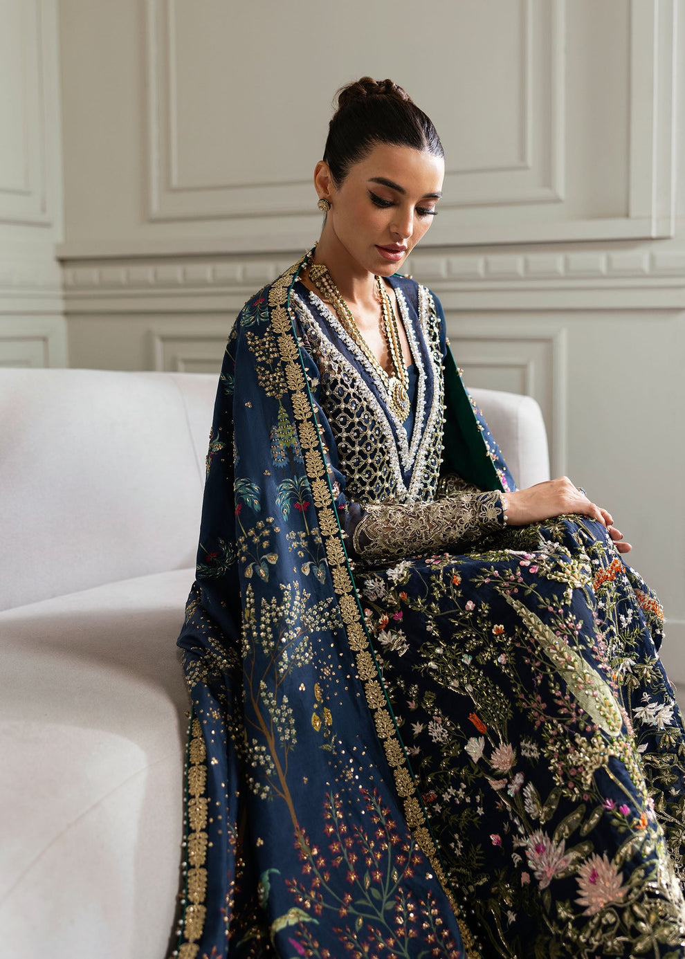 Crimson Majestic Cypress coordinating navy blue raw silk dupatta with decorative floral motifs and ornate gold-toned border