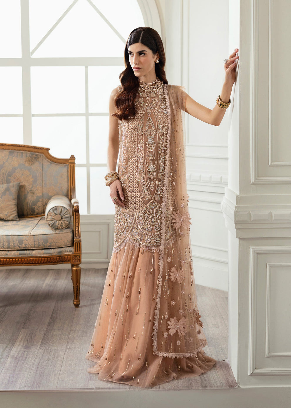 Crimson by Saira Shakira Stardust luxury champagne peach Pakistani formal dress featuring an embroidered long net shirt
