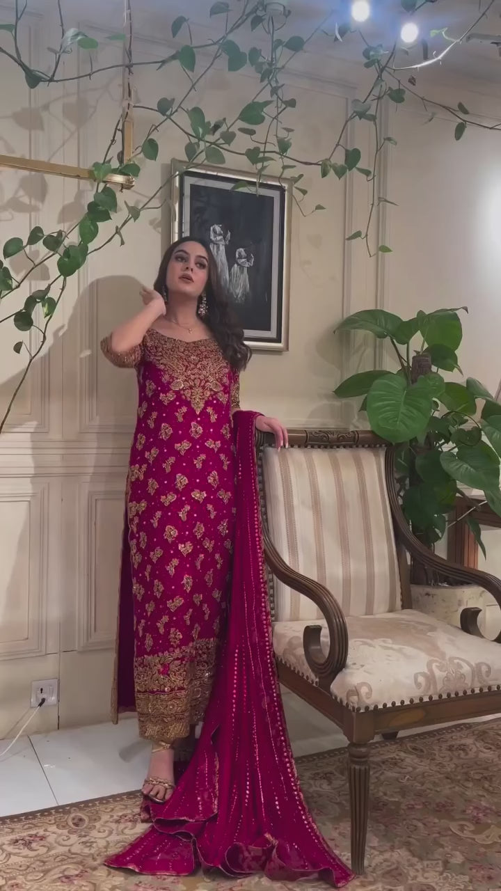 Seemal Rehan wearing Haris Shakeel Faushia fuchsia pink tassel silk formal dress with gold embroidery
