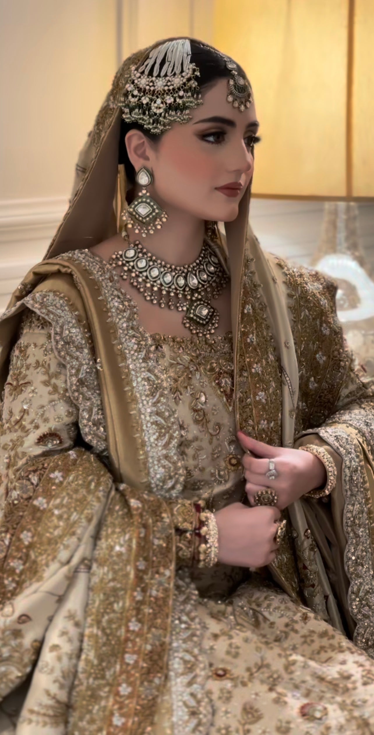 Haris Shakeel Maharni antique gold zari bridal outfit with intricately embroidered neckline at Zenni’s Atelier