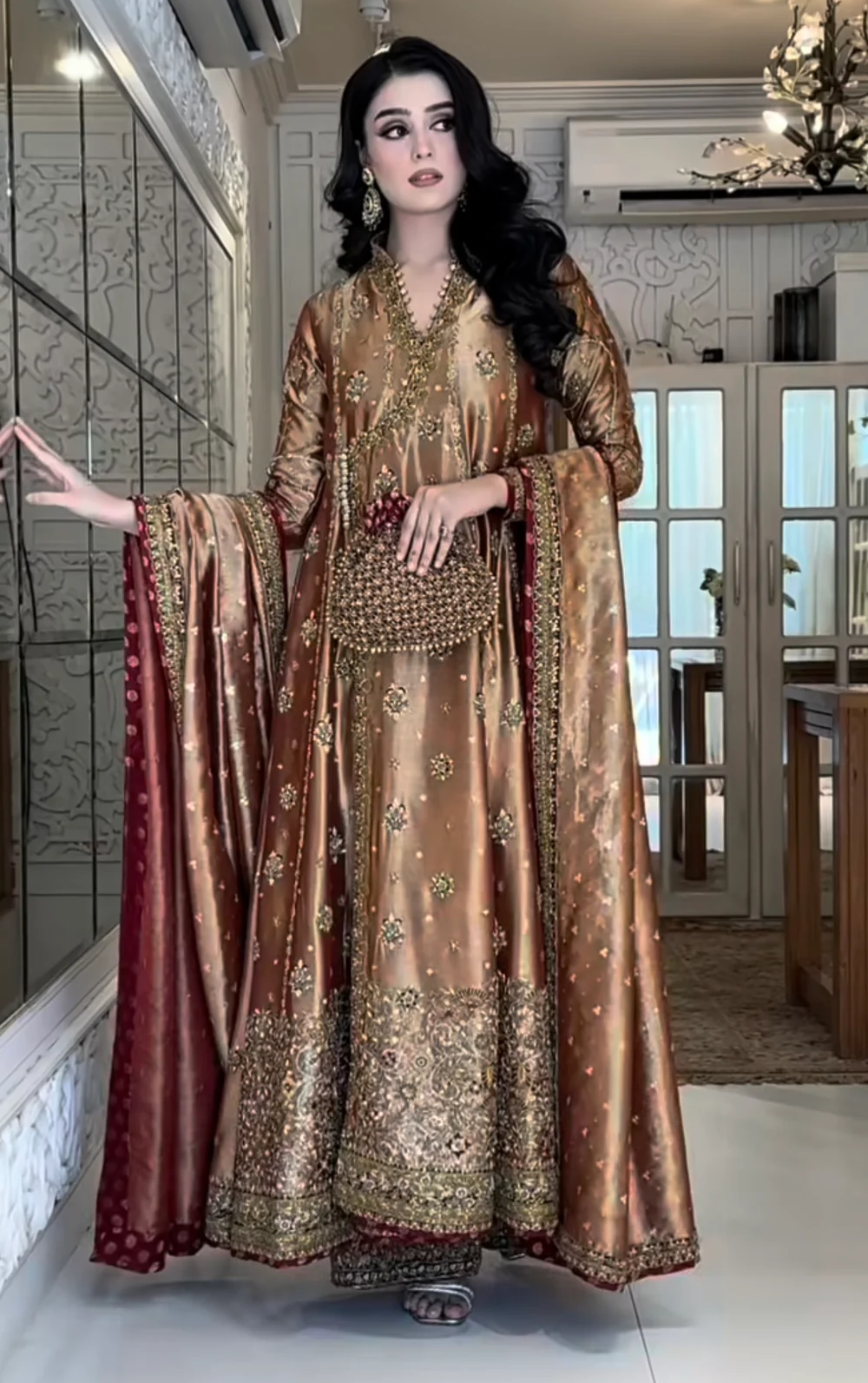 Full-length Haris Shakeel Luxury Maysoori D-8 copper brown flared Anarkali with embroidered hem at Zenni’s Atelier