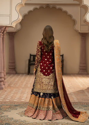 Close-up of antique gold floral and ornamental embroidery on Haseens Official Zaib maroon chiffon formal outfit