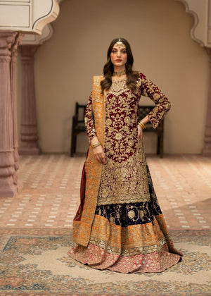 Haseens Official Zaib contrasting golden orange chiffon dupatta paired with a richly embroidered maroon formal dress