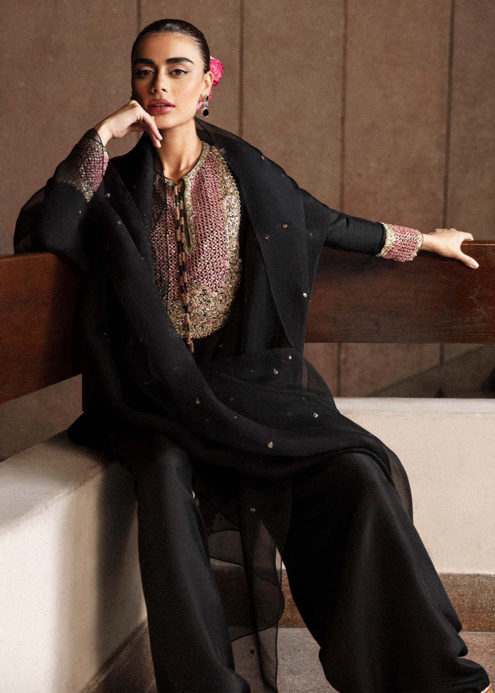 Gold-toned embellished cuffs and decorative trouser hem borders on Hussain Rehar Char black outfit