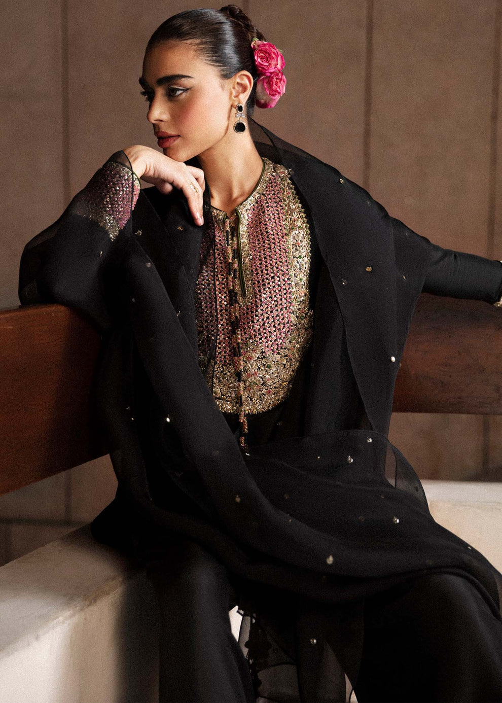 Zara Peerzada modelling Hussain Rehar Char black raw silk ensemble with sheer organza dupatta