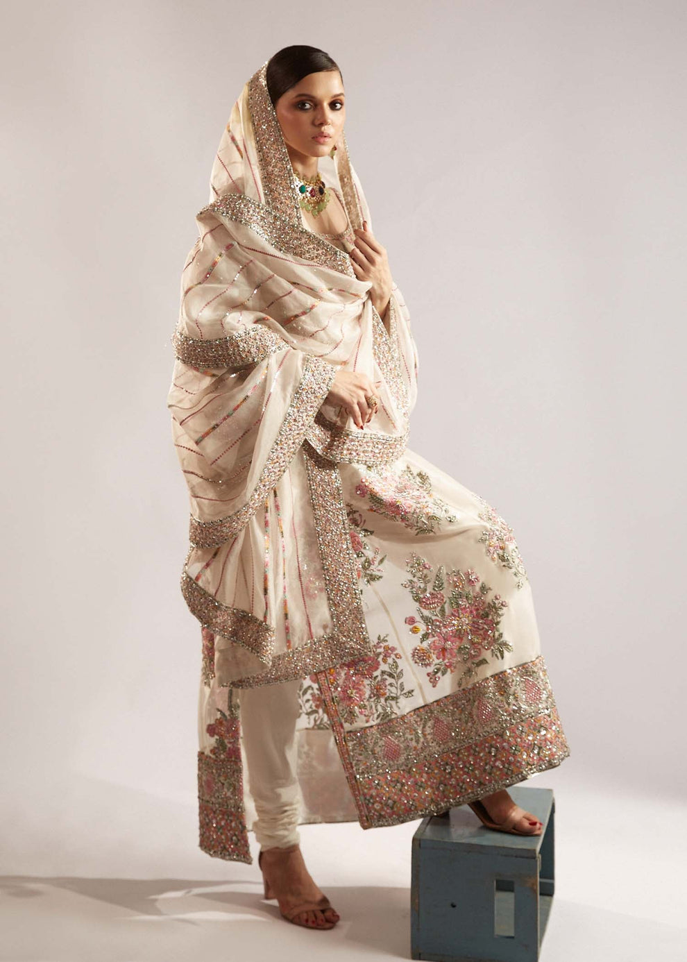 Hussain Rehar EURU luxury ivory Pakistani formal outfit featuring colourful floral embroidery