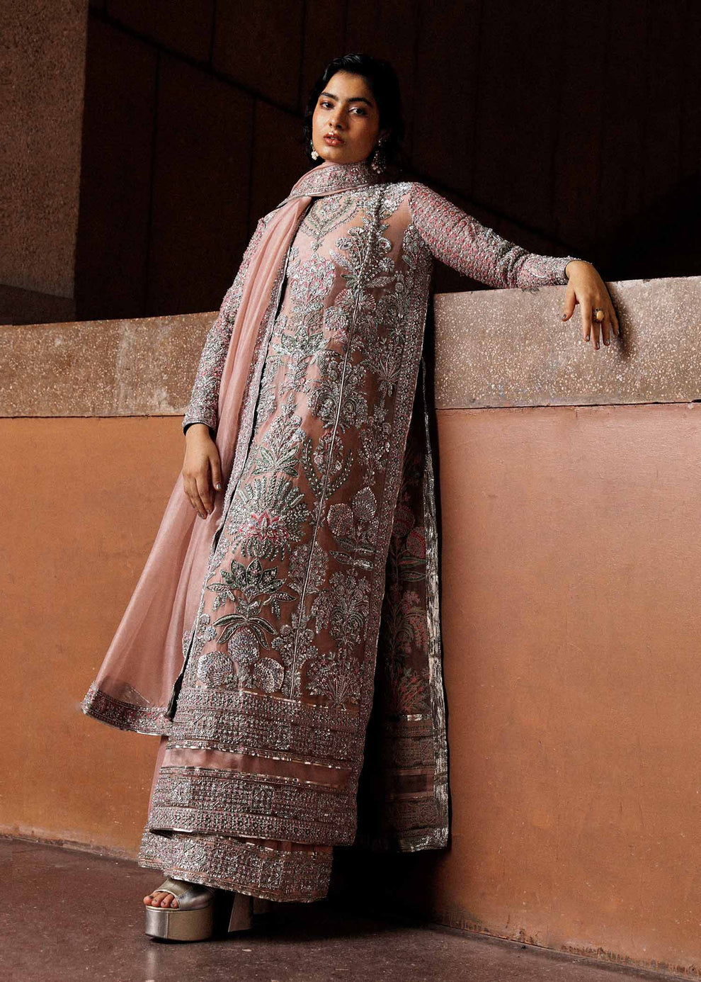 Close-up of silver gold and sage green floral embroidery on Hussain Rehar Verve peach organza shirt