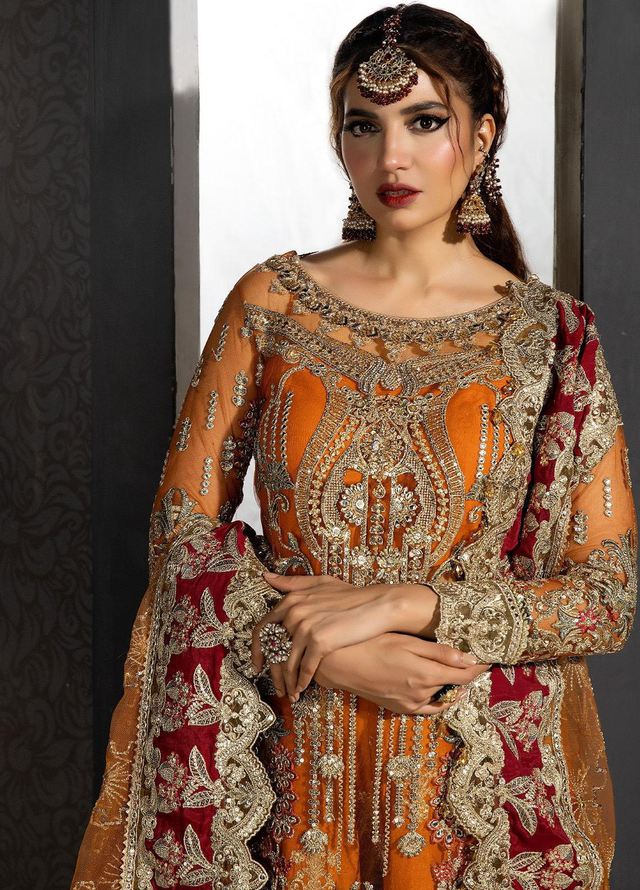 Close-up of antique gold and silver-toned floral embroidery on Imrozia Premium IB-42 orange formal dress