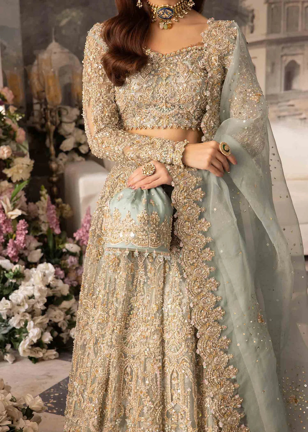 Kanwal Malik Nazra luxury sage green Pakistani Walima maxi featuring a flowing embroidered organza silhouette