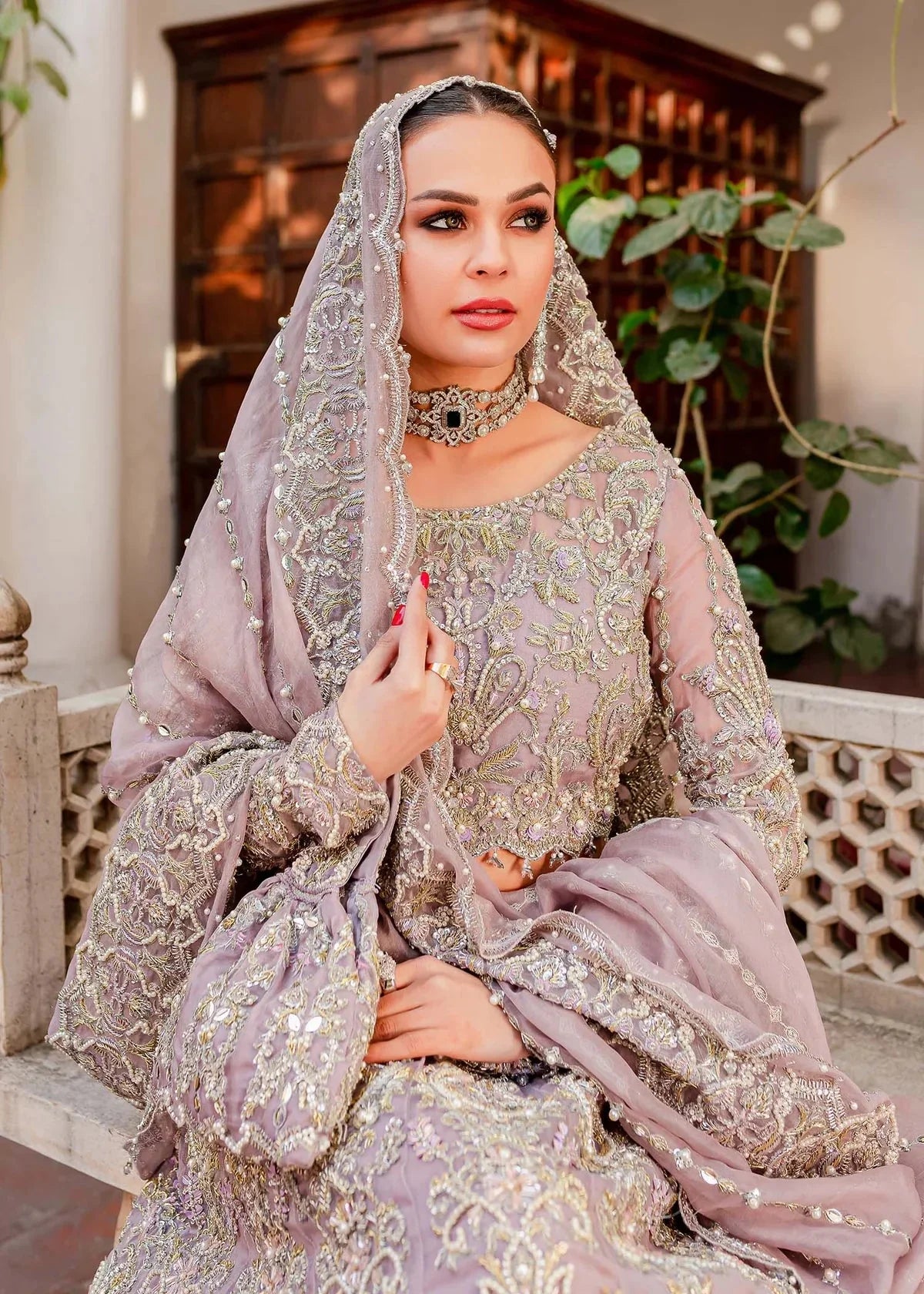 Tulip Ikram wearing Kanwal Malik Zaarish dusty lavender embroidered organza outfit with matching dupatta for a Pakistani wedding reception