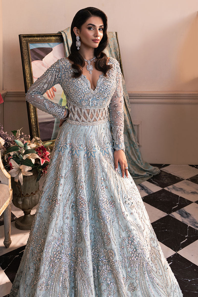 Khakaa Shimmering Ice tassel silk maxi with intricate silver embroidery and embellished V-neckline at Zenni’s Atelier