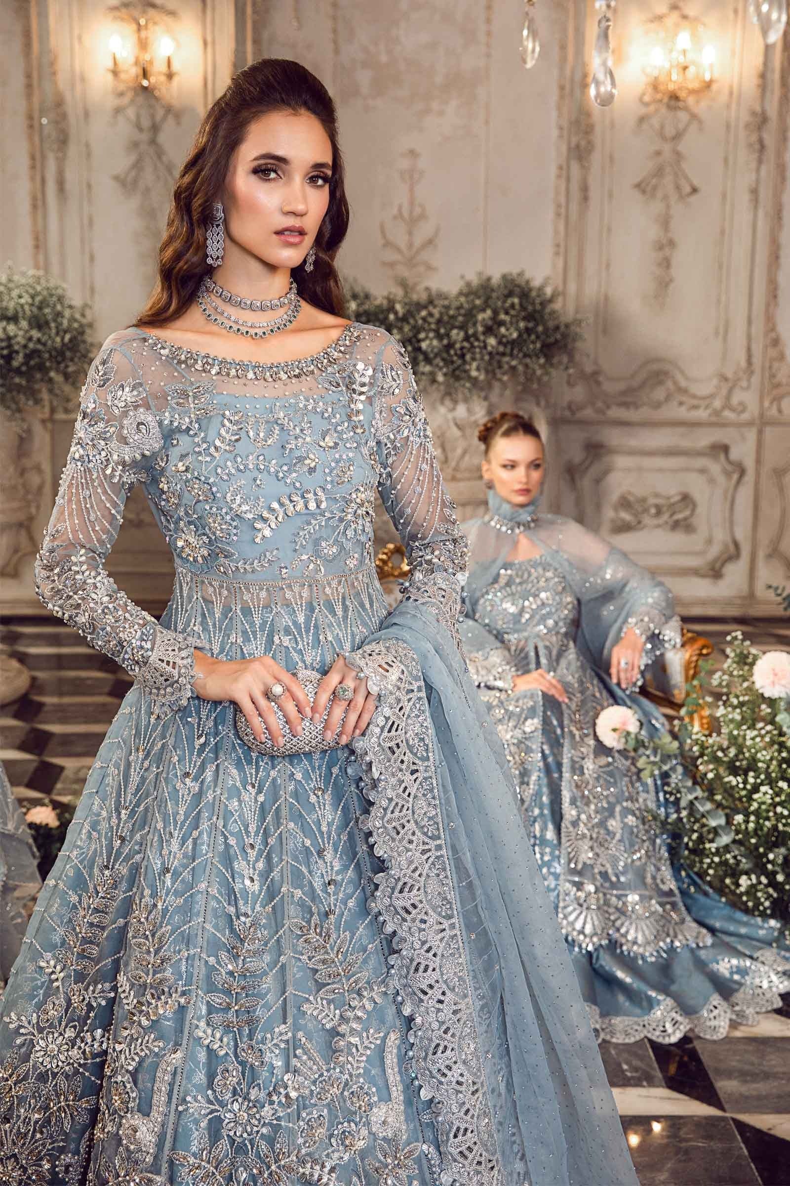 Full-length Maria.B Bridal D-2 luxury ice blue flared maxi with ornate embroidered hemline at Zenni’s Atelier