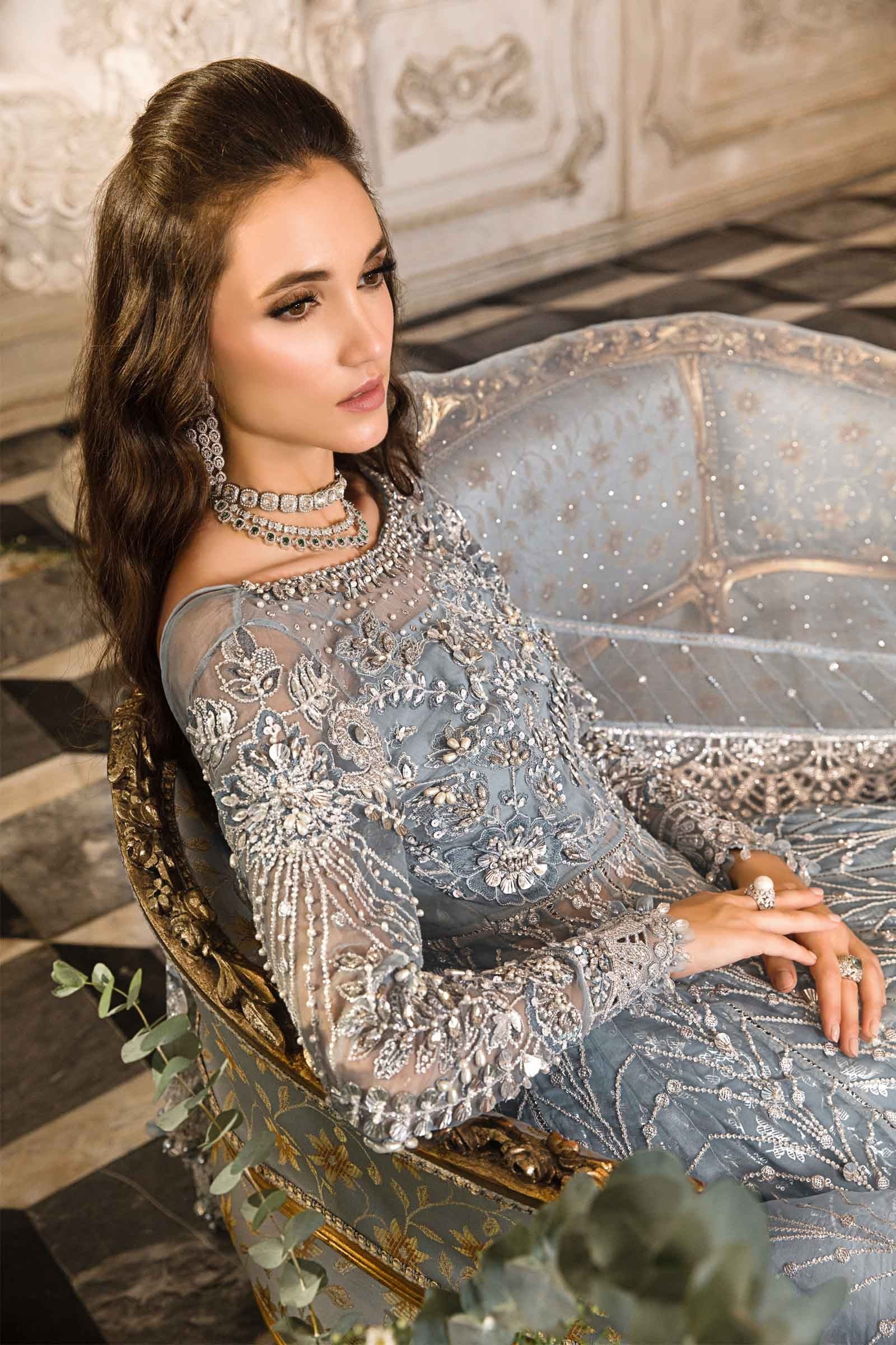 Rida Ali modelling Maria.B Bridal D-2 ice blue Pakistani walima and wedding reception dress at Zenni’s Atelier