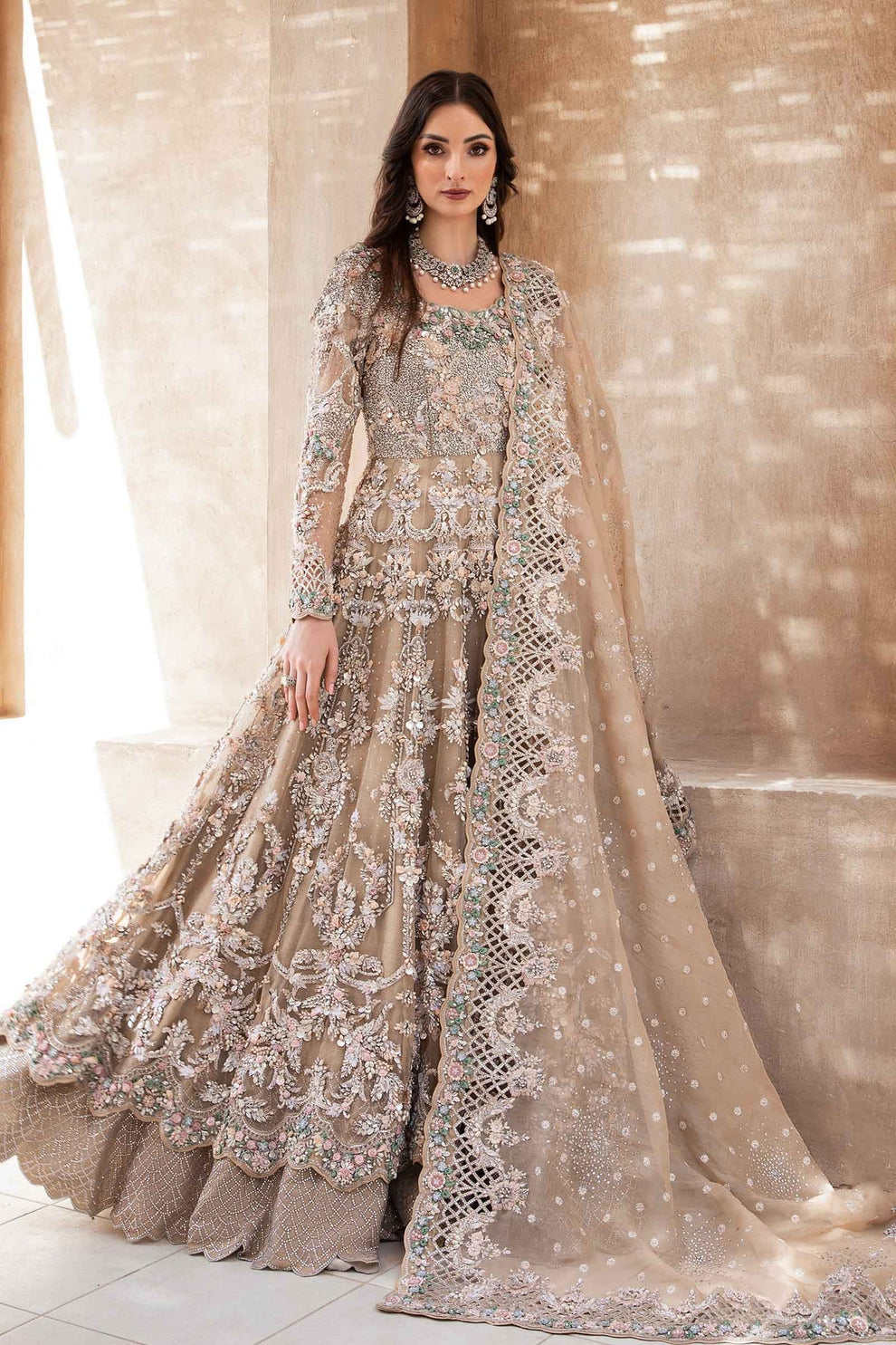 Close-up of pastel floral embellishments and silver-toned embroidery on Maria.B Brides Lunara organza bodice