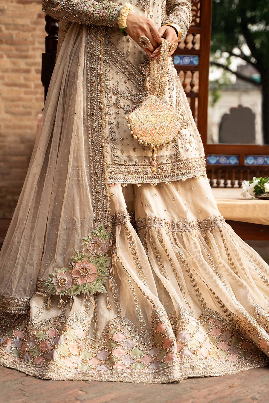 Mehwish Khan modelling Maria.B Ishtar luxury embroidered champagne organza dress for Pakistani wedding celebrations