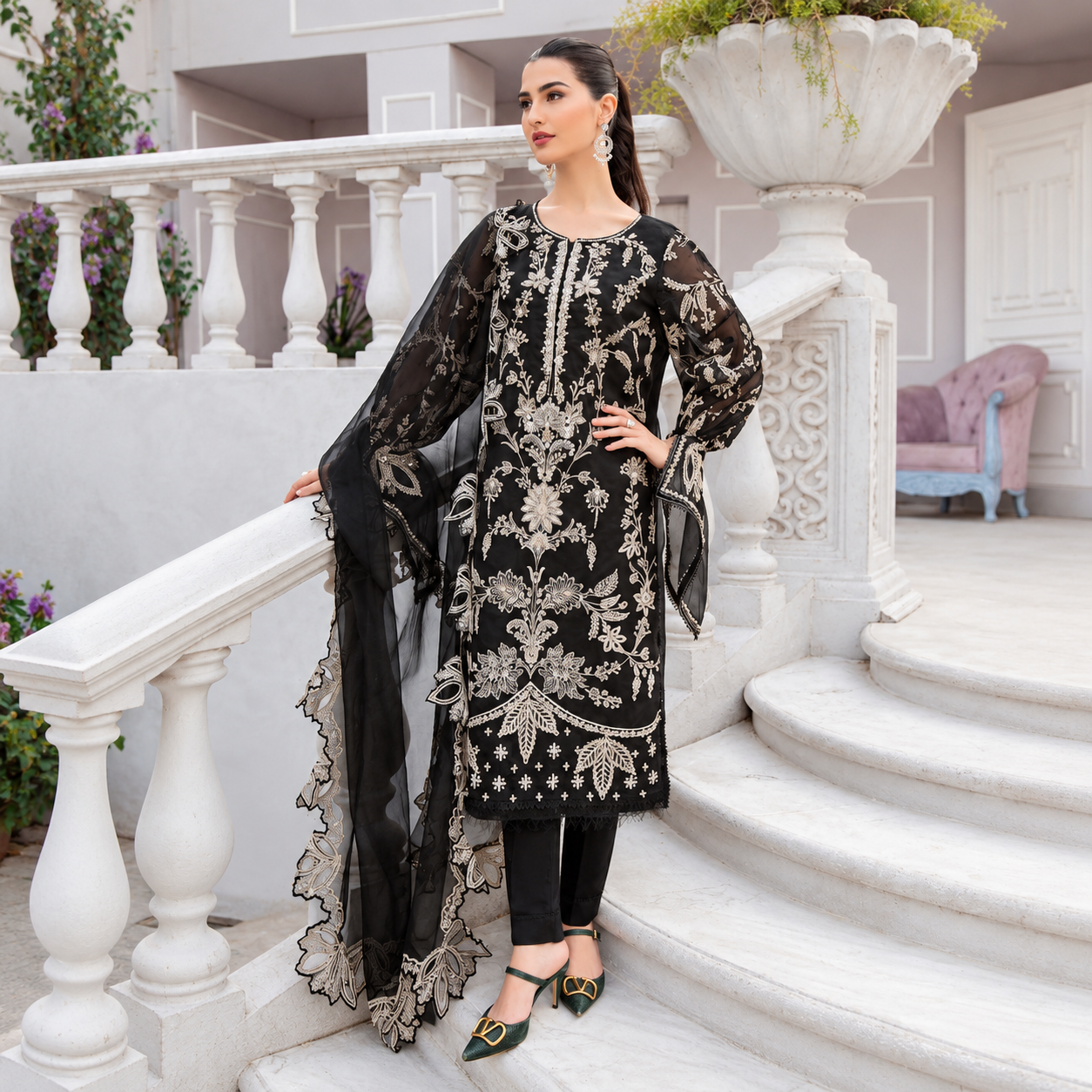 Hajra Asmi wearing Maria.B SF-EA23-28R1 black organza formal dress with intricate ivory floral embroidery