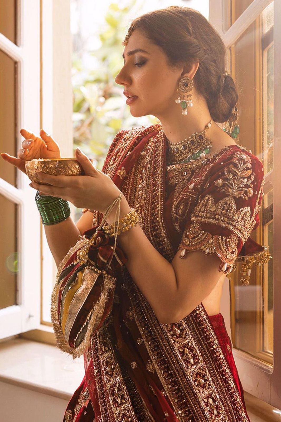 Rimsha Kiani modelling MNR Bridal Ensemble in deep maroon raw silk with net dupatta at Zenni’s Atelier