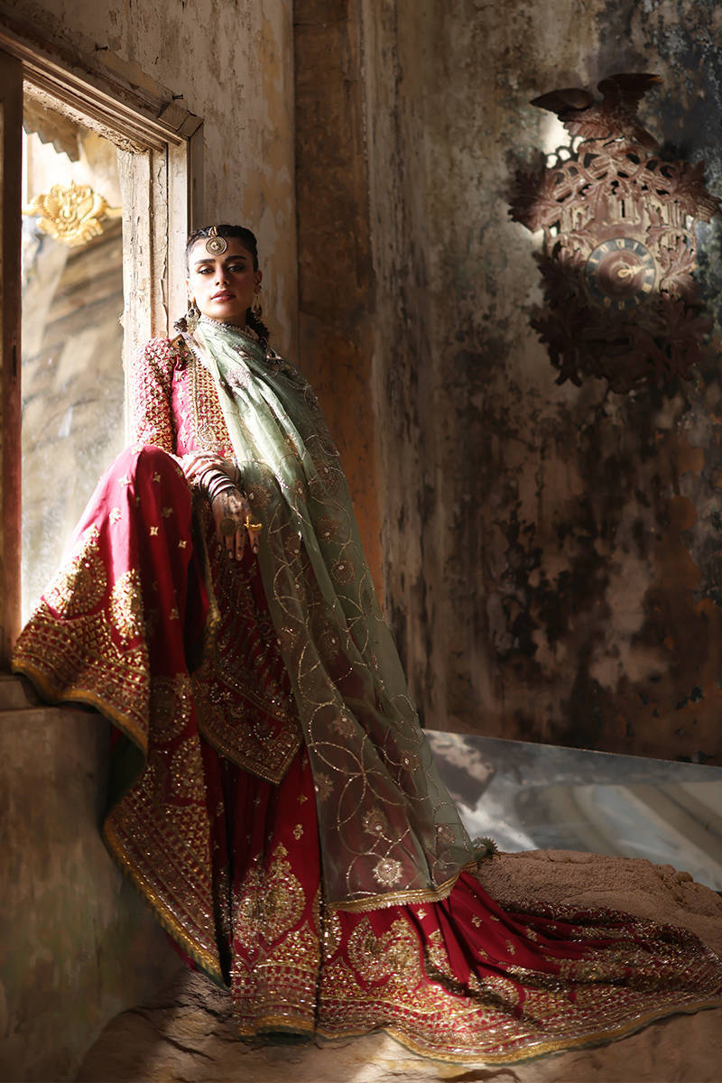 Mohsin Naveed Ranjha Ruhi Begum luxury red Pakistani bridal lehenga with heavily embroidered silk shirt and flowing skirt