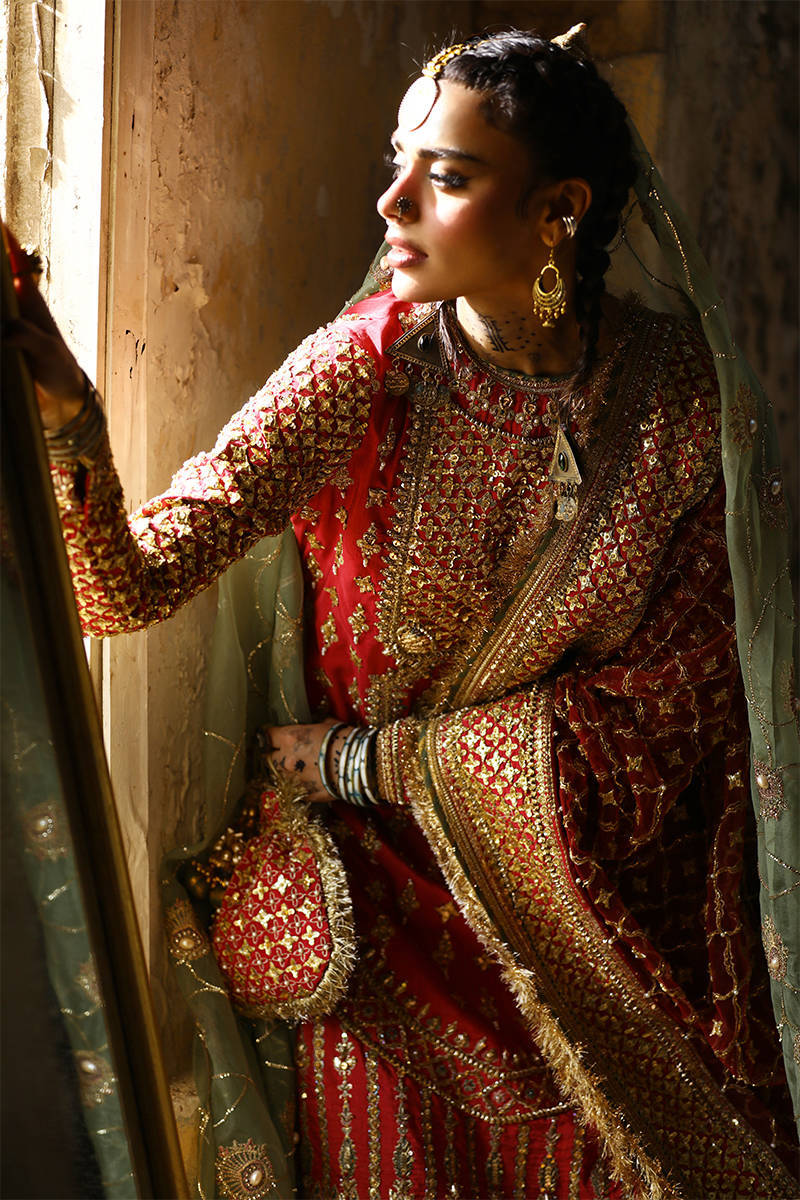 Sadaf Kanwal modelling Mohsin Naveed Ranjha Ruhi Begum luxury crimson red Pakistani bridal wedding dress