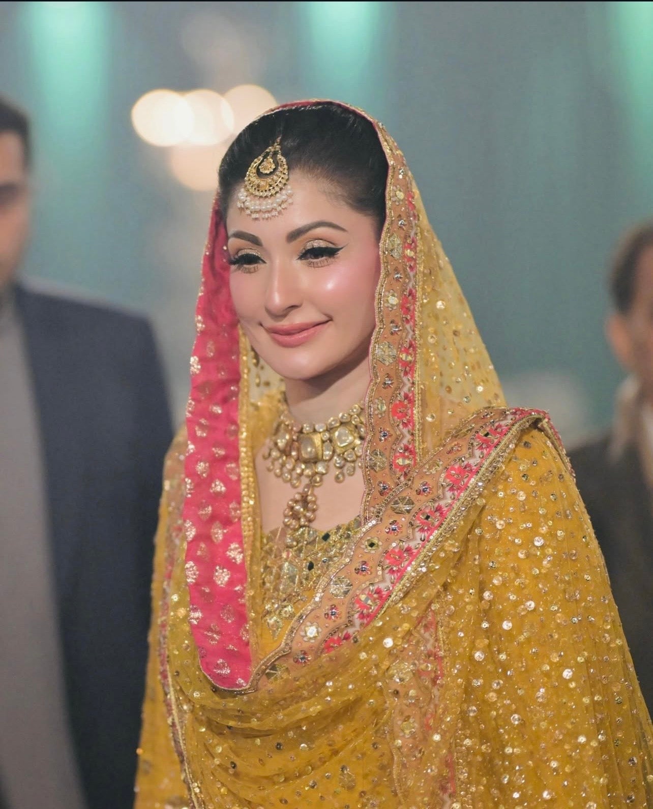 Maida Raza modelling Nomi Ansari NAB-22-110 luxury mustard yellow Mehndi bridal lehenga with net dupatta at Zenni’s Atelier