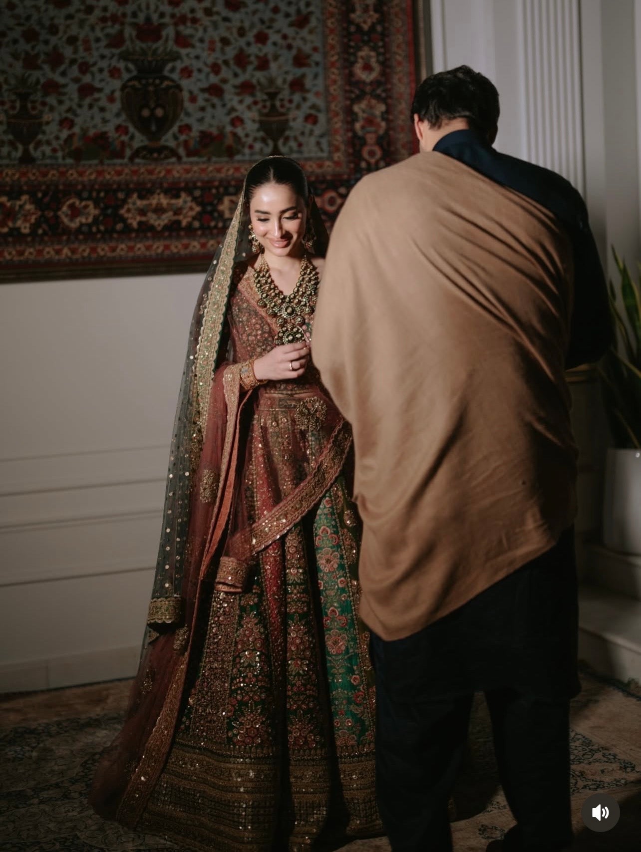 Sabyasachi Mukherjee emerald green and maroon 18 panel bridal lehenga with ornate gold embroidery at Zenni’s Atelier