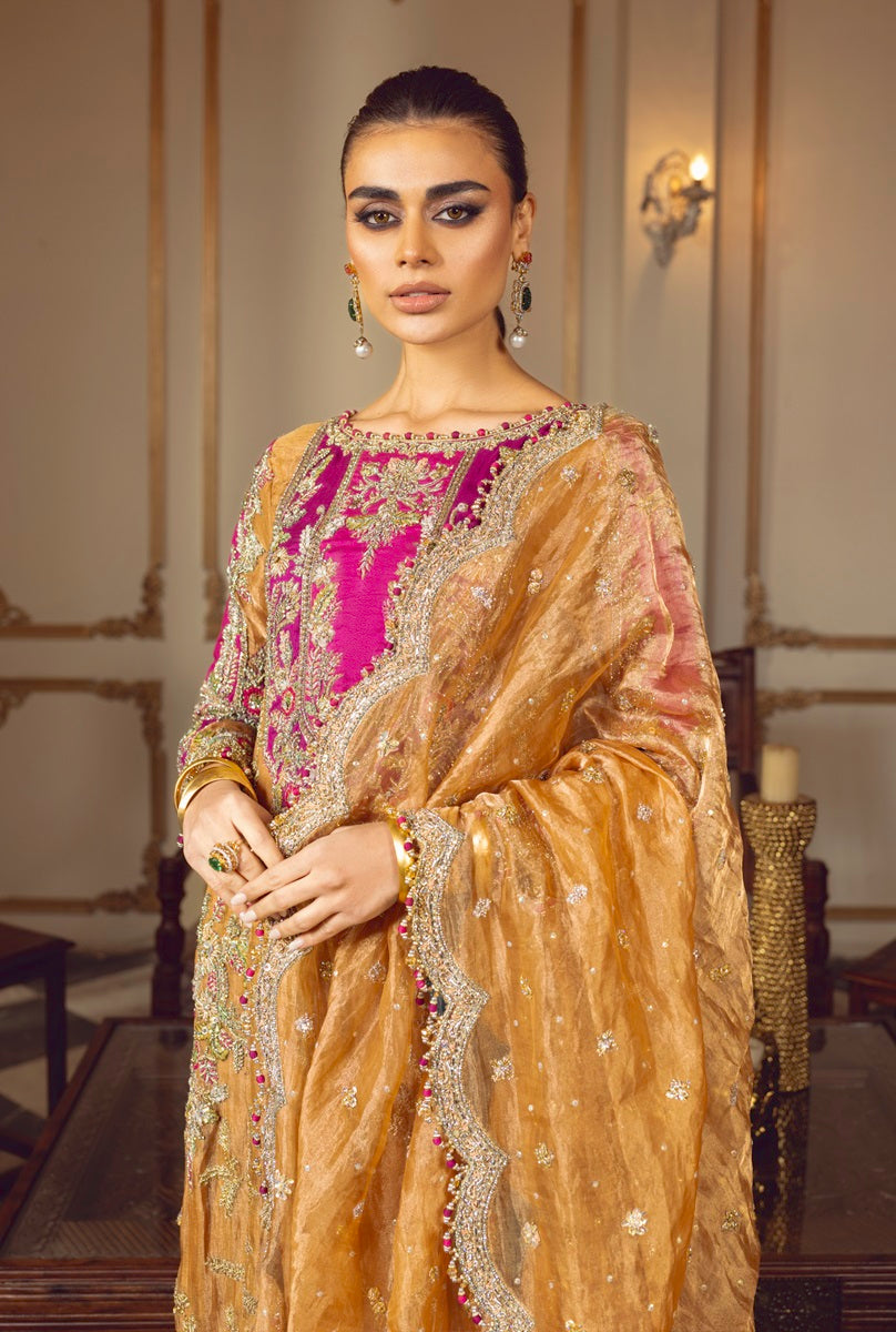 Sara Rohail Asghar Sultanique matching mustard gold silk dupatta styled with a luxurious embroidered Pakistani formal dress