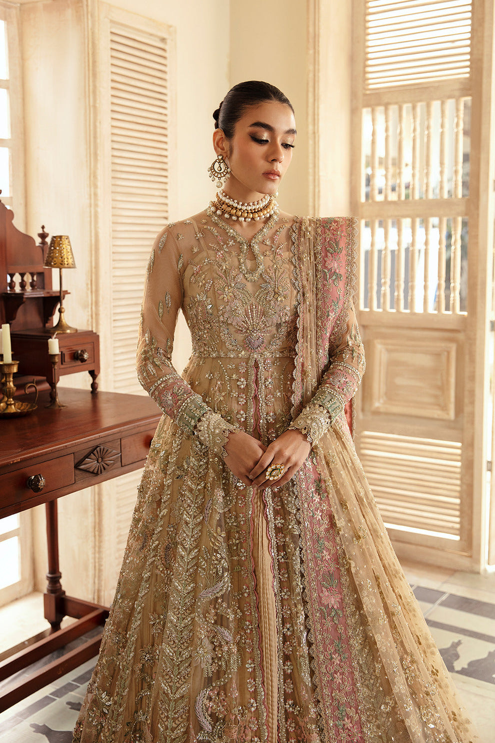 Soraya Irina champagne gold Pakistani wedding outfit featuring an embroidered organza shirt