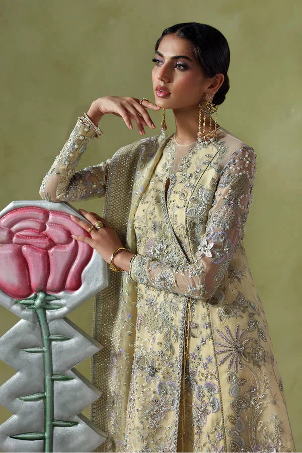 SORAYA Liora matching pastel yellow organza dupatta featuring delicate floral embroidery and decorative border at Zenni’s Atelier
