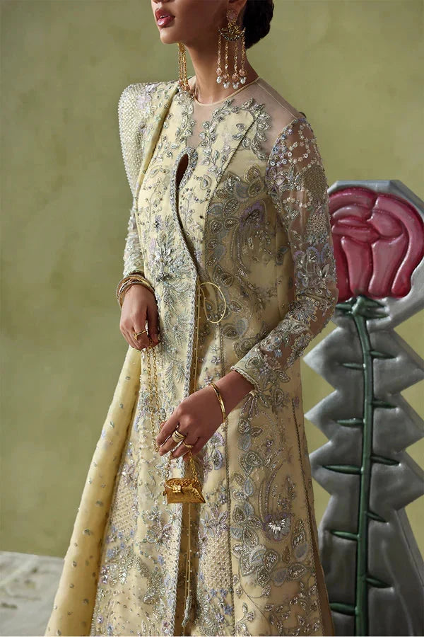 Full-length SORAYA Liora pastel yellow embroidered A-line shirt with flared lower garment at Zenni’s Atelier
