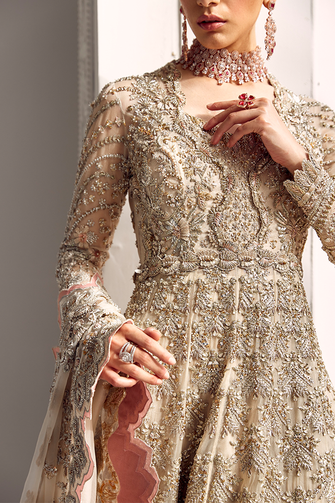 Close-up of intricate champagne gold floral embroidery and embellished bodice detailing on Suffuse Alena organza dress