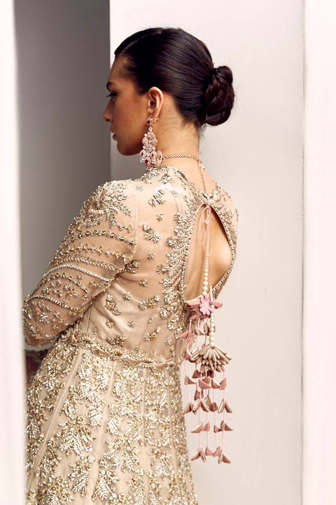 Maro Mogul wearing Suffuse Alena luxury champagne gold embroidered organza maxi dress for formal wedding occasions