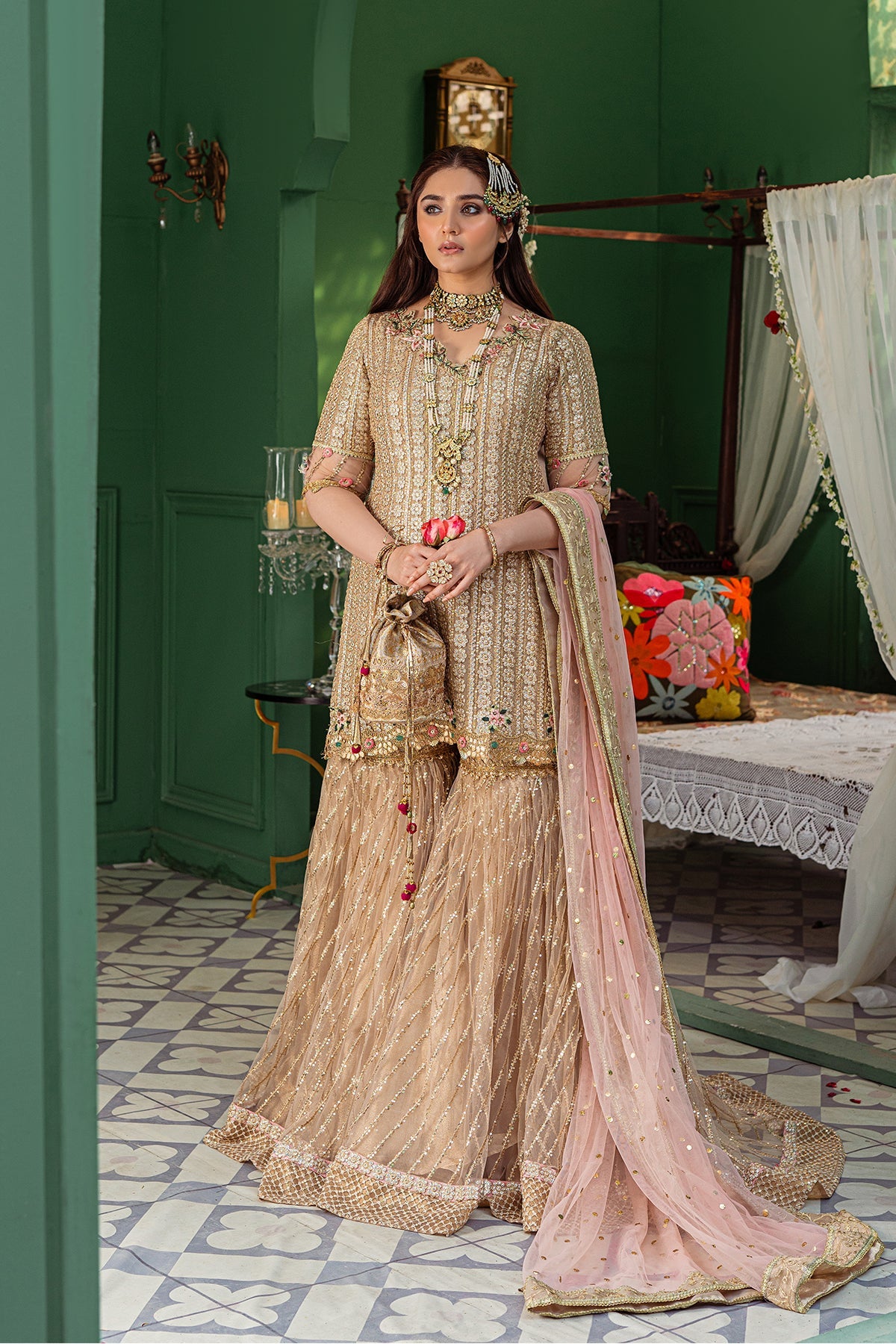 Close-up of intricate antique gold embroidery on Tabya Nagma champagne gold chiffon formal dress