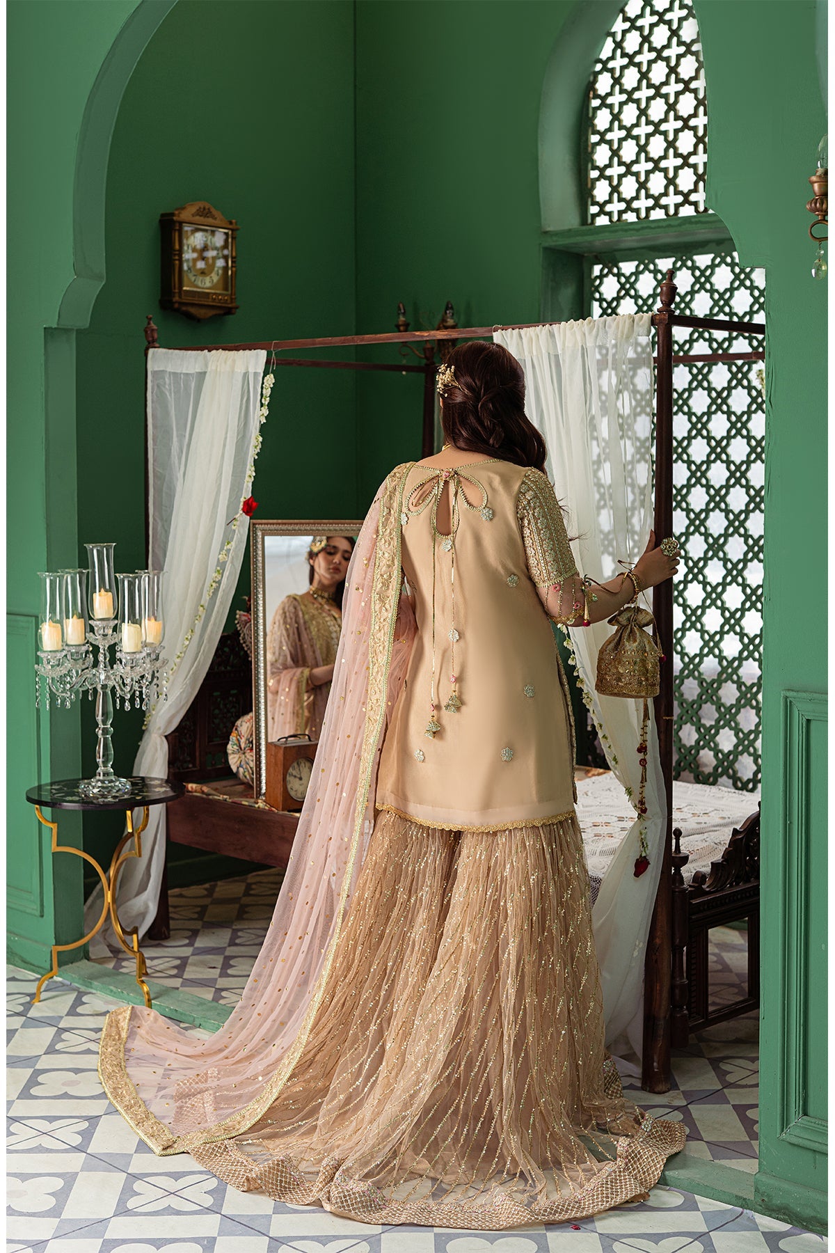 Fazeela Abbasi wearing Tabya Nagma elegant champagne gold Pakistani designer formal outfit